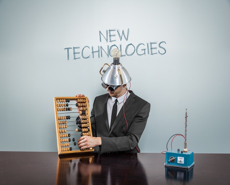 New technologies concept with vintage businessman using abacus
